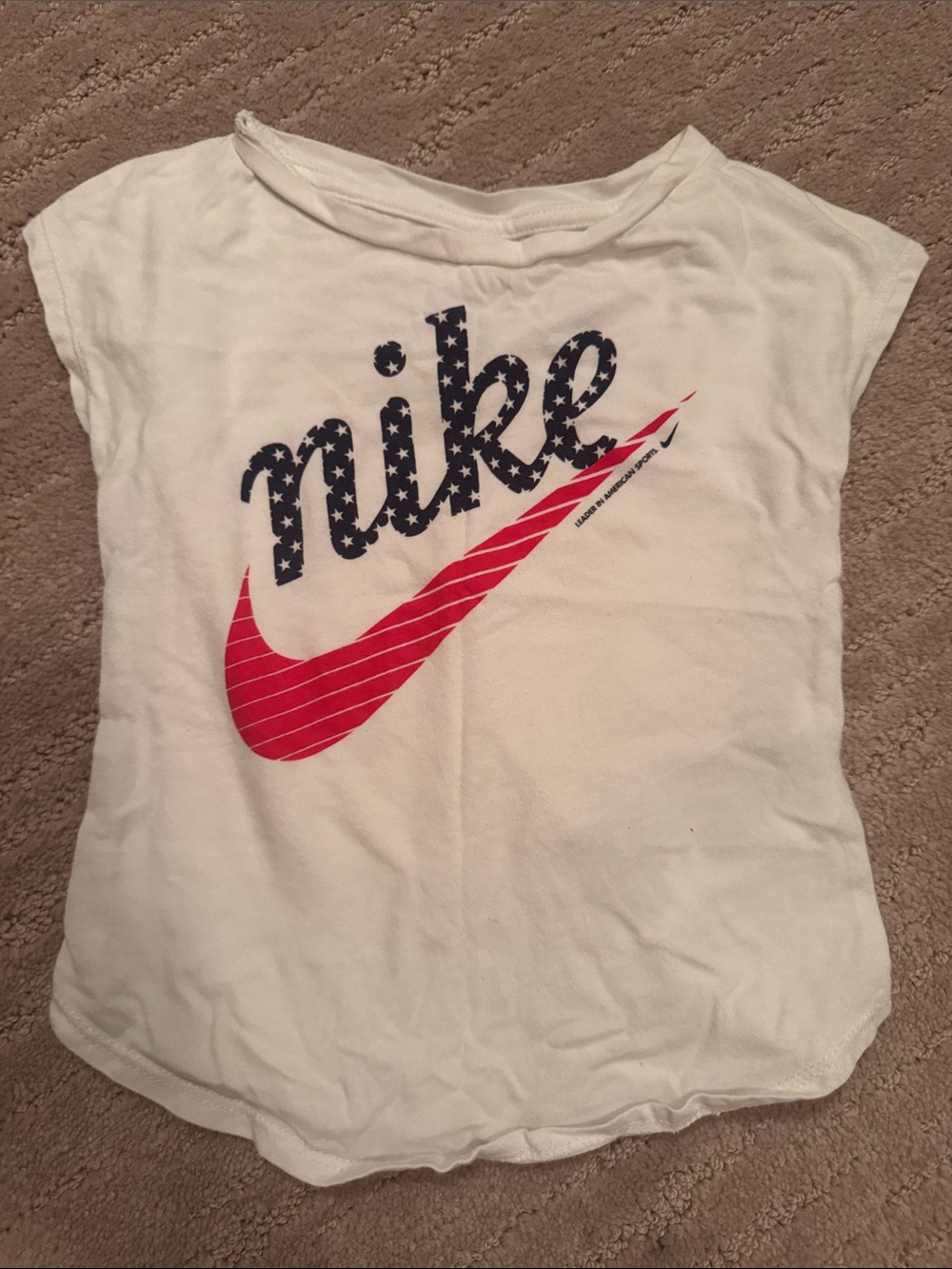 Nike White Short Sleeve Tee with Navy Star 'nike' and Red Swoosh